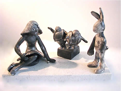 Small sculpture group of Alice, Tweedledee and Tweedledum, and White Rabbit entitled 'Alice's Party' - raku fired ceramics